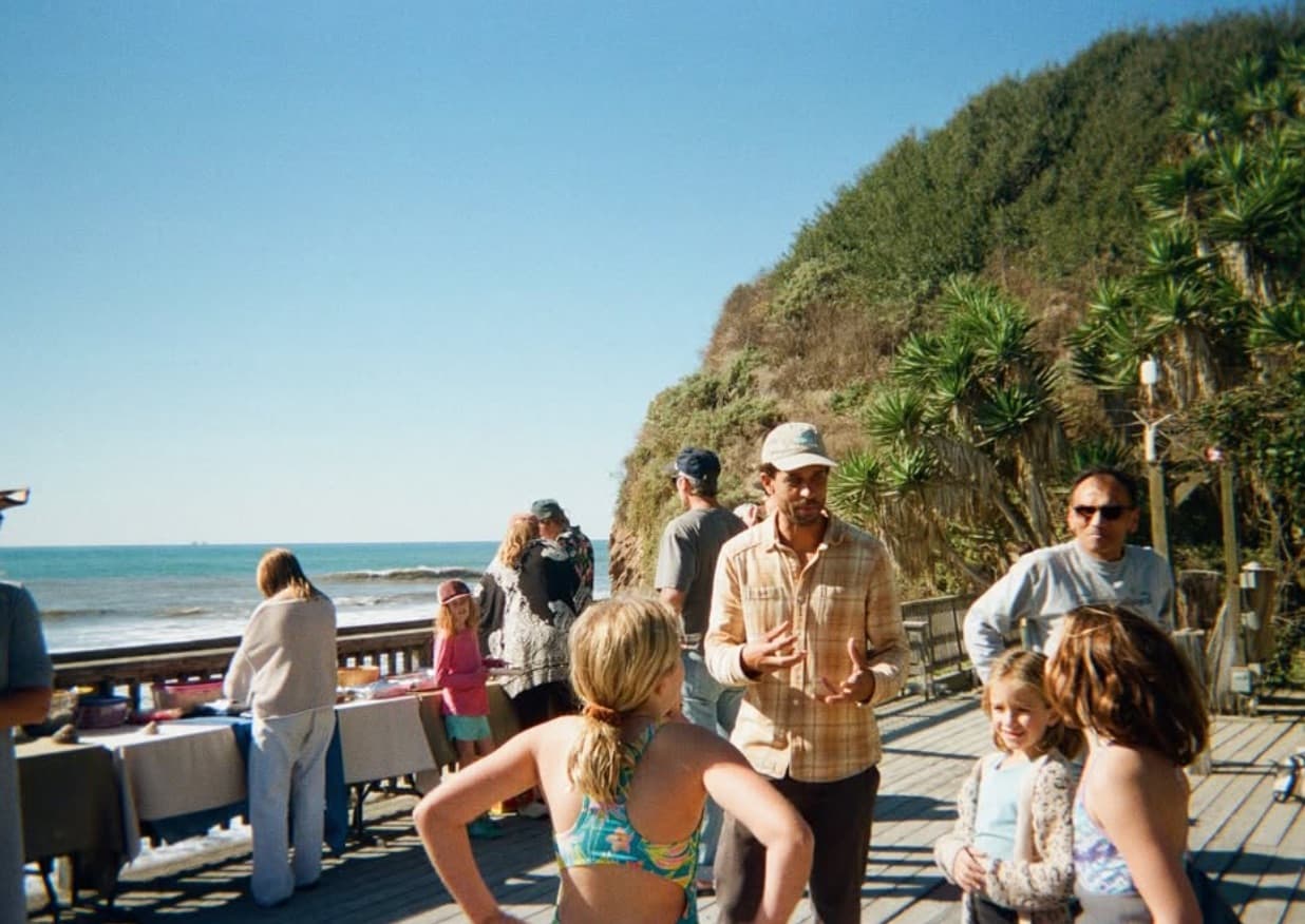 Coaches and kids at the shore
